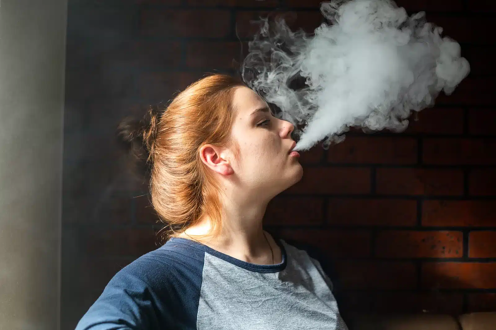 Vaping Teenager With Problem Skin. Portrait Of Young Cute Girl